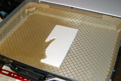suitcase with foam scrap